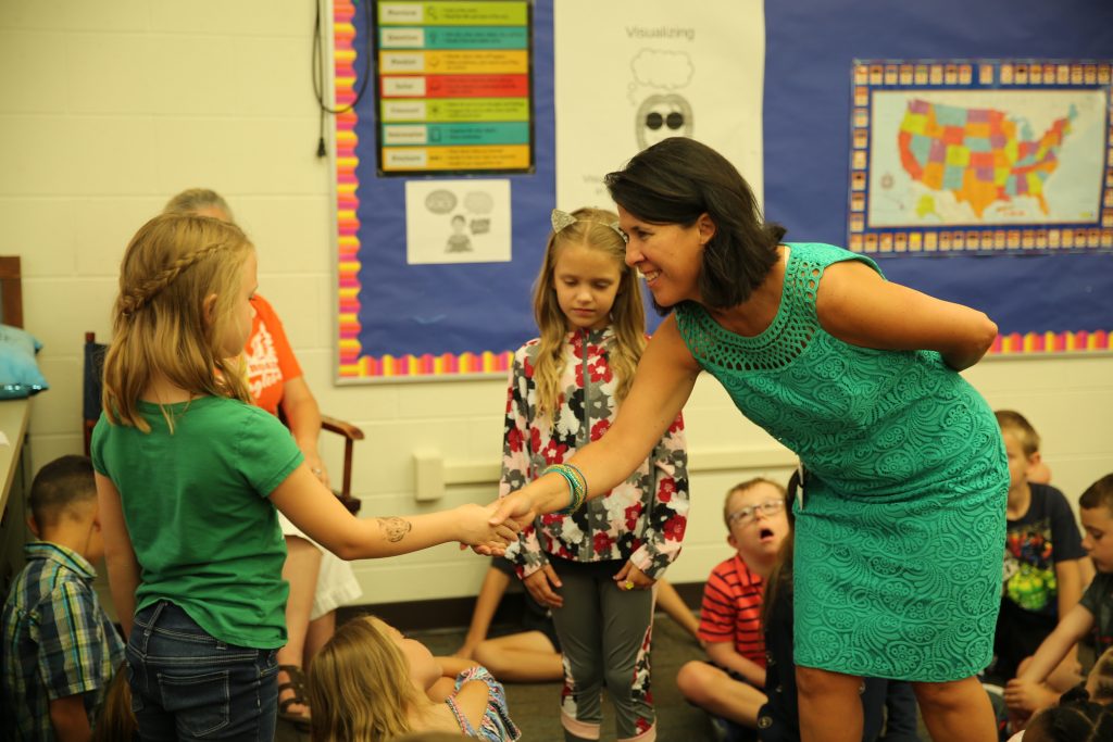 Elm Road Principal Dr. Lisa Soto Kile introduces herself to new students