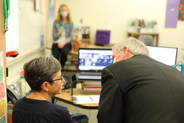 Dr. Thacker visits with Mrs. Shreiner and her virtual students