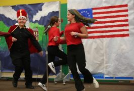 students dancing on stage