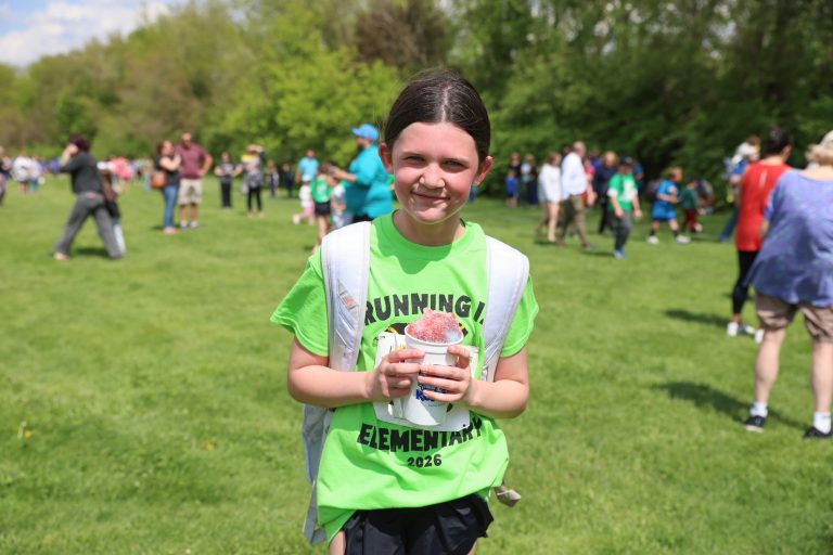 Running is Elementary: Mary Frank student with snow cone